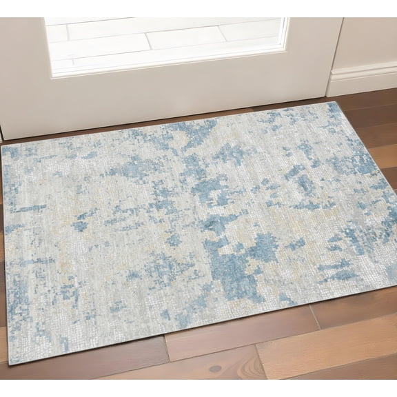 2' X 3' Ivory And Sky Blue Abstract Area Rug