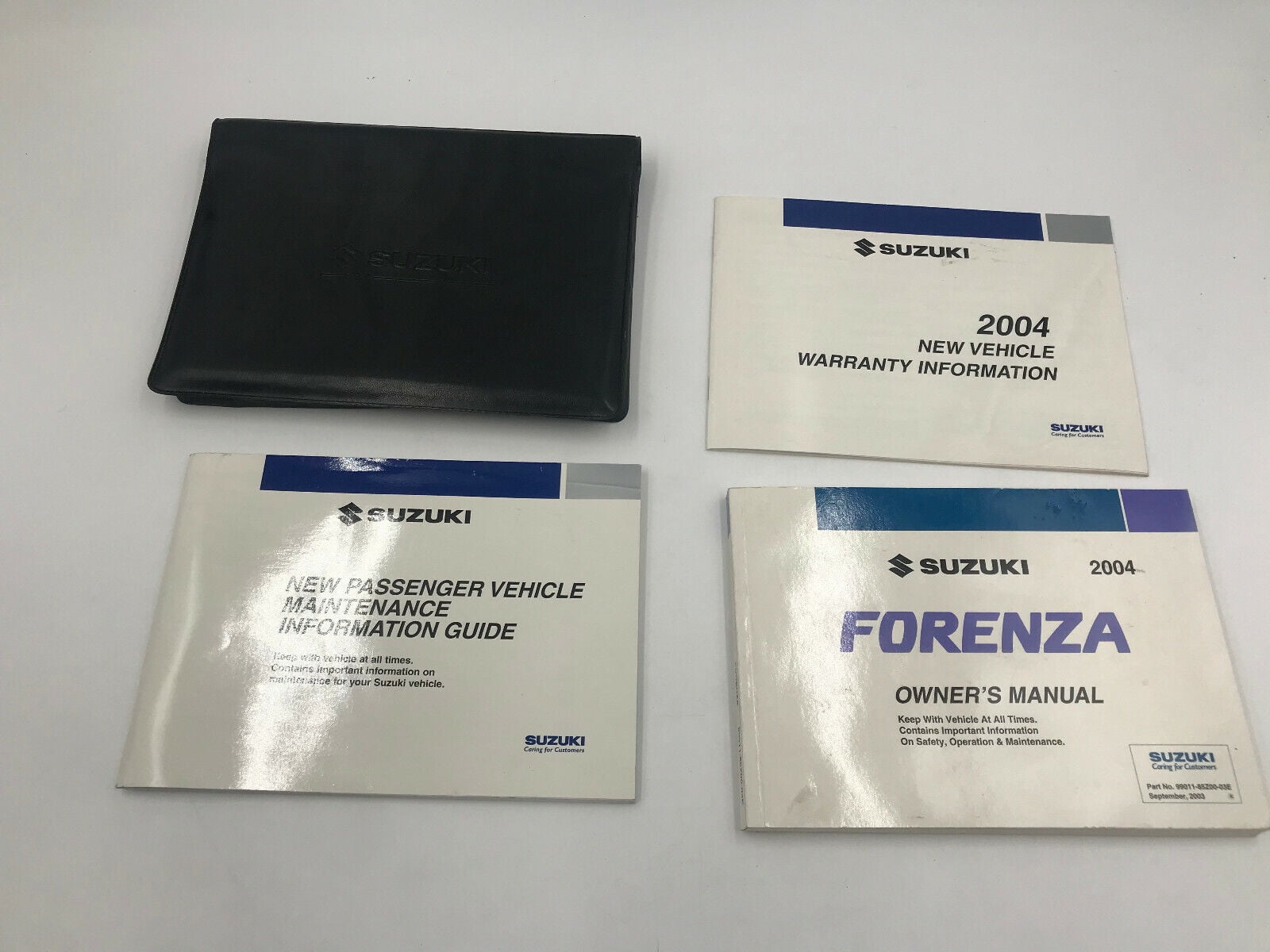 2004 Suzuki Forenza Owners Manual Set with Case K01B04008