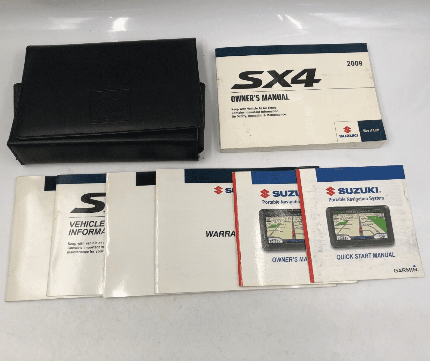2009 Suzuki SX4 Owners Manual Handbook Set with Case OEM F01B49070