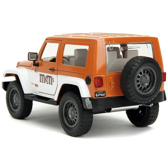 2017 Jeep Wrangler Orange Metallic and White and Orange M&M Diecast Figure "M&M's" "Hollywood Rides" Series 1/24 Diecast Model Car by Jada