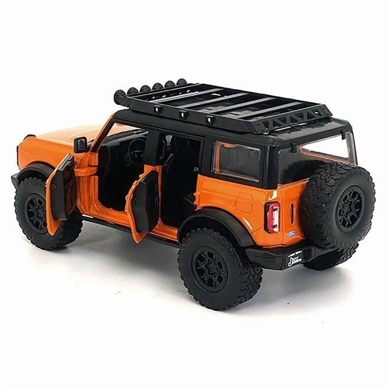 2021 Ford Bronco Orange with Black Stripes and Roof Rack "Just Trucks" Series 1/24 Diecast Model Car by Jada