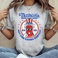 thumbnail image 1 of 2025 Funny Nathans Famous 2025 Hot Dog Eating Contest T-Shirt, Men's And Women's Graphic Tee 100% Cotton by TBun, Full Sizes S-5XL, 1 of 5