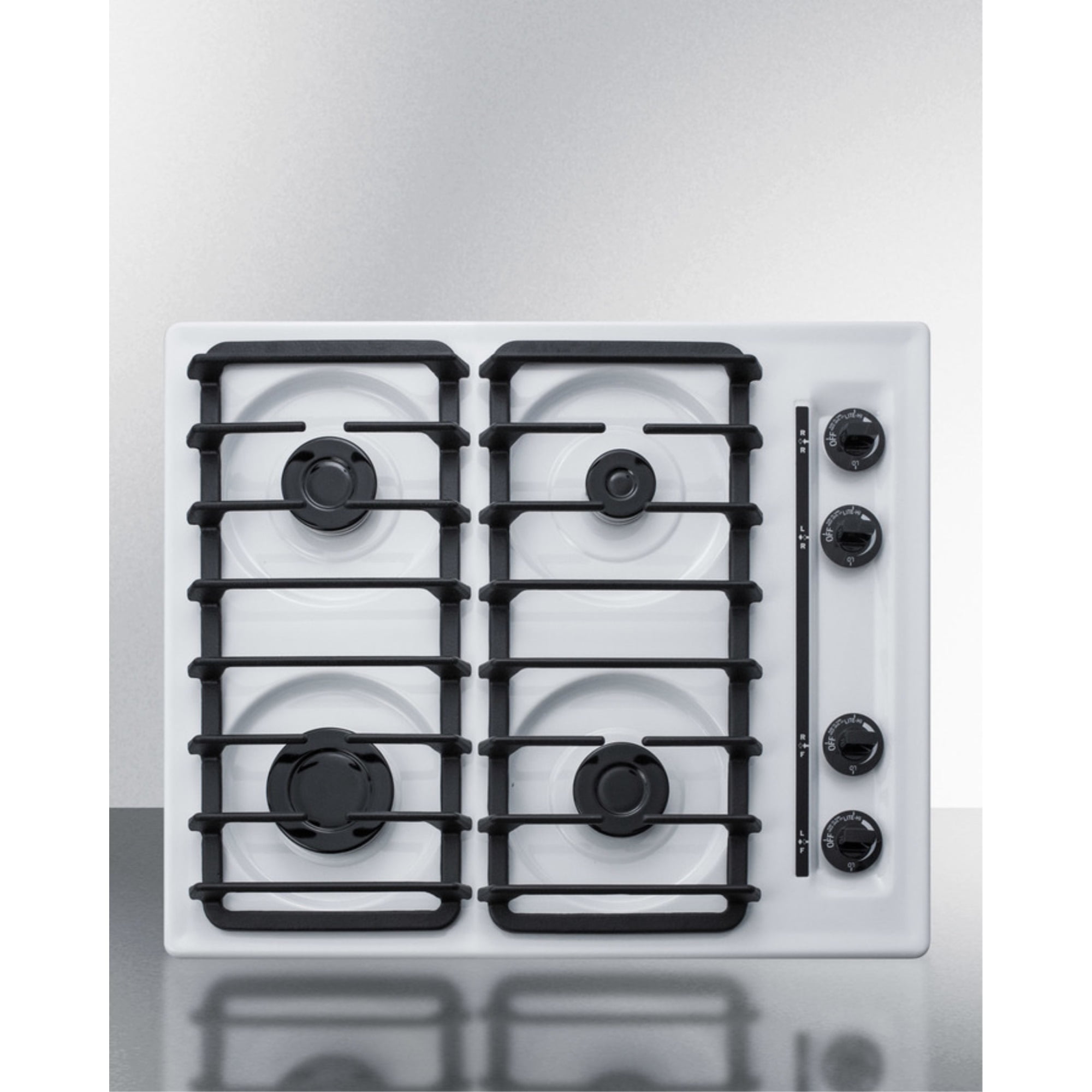24" wide gas cooktop with four sealed burners, white porcelain surface, and cast iron grates; made in the USA