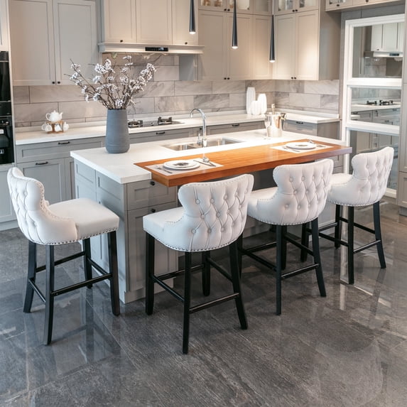 27" Padded Bar Stools, Tufted Velvet Upholstered Wing-Back Barstools with Nailhead Trim, Footrest and Solid Wood Legs, Comfy Button Tufted Counter Height Chairs Kitchen Chairs (Beige,Set of 4)