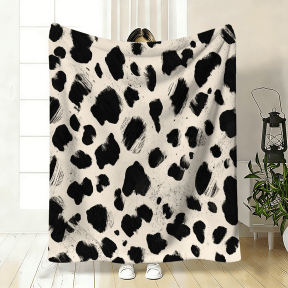 2D flat, "cow pattern" flannel blanket. Soft and skin-friendly, suitable for scenarios such as sofas, beds, and offices. Specification dimensions: 30×40 inches, 40×50 inches, 50×60 inches.