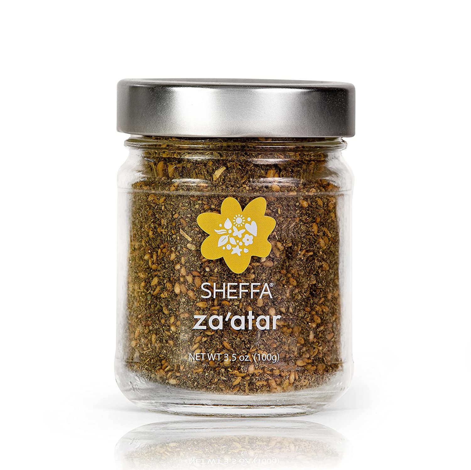 Zaatar spice blend ingredients: dried thyme, sesame seeds, sumac, and oregano.
