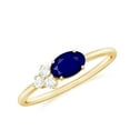 thumbnail image 1 of Rosec Jewels Natural Oval Cut Blue Sapphire Promise Ring with Diamond Trio, 10K Yellow Gold, US 5.50, 1 of 9