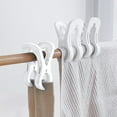 thumbnail image 1 of 3 Pack Large Heavy Duty Windproof Plastic Clothes Pins Beach Towel Clips Blanket Clips for Laundry Drying Rack Quilt Sheet Curtain Hanging Strong Grip Multipurpose Clamps for Indoor Outdoor, 1 of 3