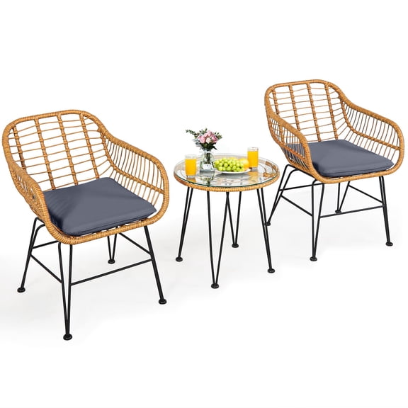 3-Piece Outdoor Wicker Bistro Set Brownish Yellow Rattan Frame Grey Cushions Round Glass Table