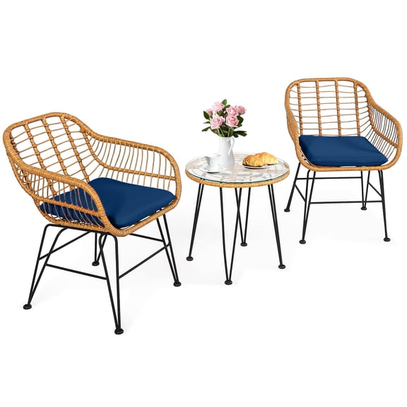 3-Piece Outdoor Wicker Bistro Set Brownish Yellow Rattan Frame Navy Cushions Round Glass Table