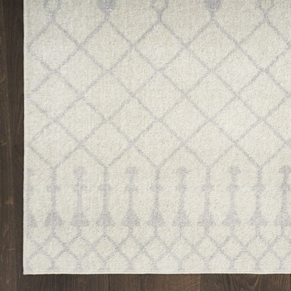 3' X 5' Blue and Ivory Abstract Power Loom Washable Area Rug