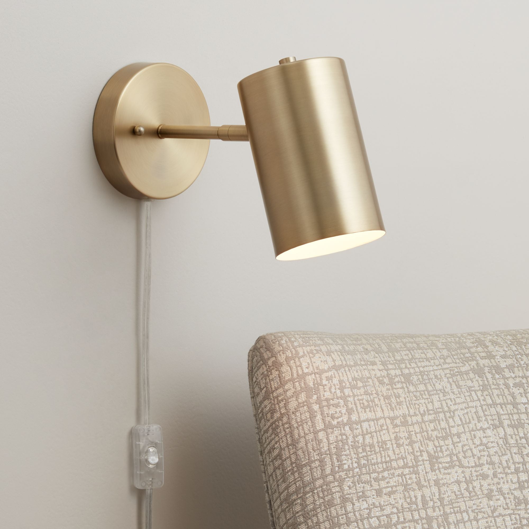 Elegant Carla Brushed Brass Adjustable Plug-In Wall Lamp