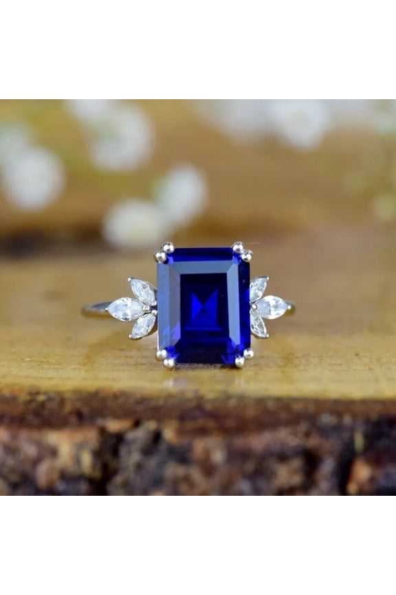 3Ct Emerald Cut Simulated Blue Sapphire Engagement Ring In 14K White Gold Plated Streling Silver
