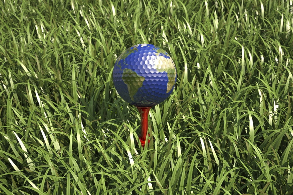 3D rendering of an Earth golf ball on tee in the grass Canvas Art - Leonello CalvettiStocktrek Images (35 x 23)