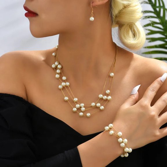 3PC Pierced gold and white pearl necklace, earrings & bracelet set