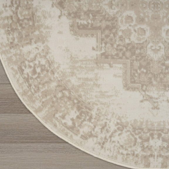 4' Ivory Floral Power Loom Worn Faded Round Rug