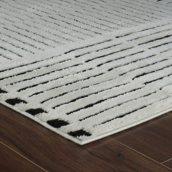 4' X 6' Cream and Black Abstract Distressed Area Rug
