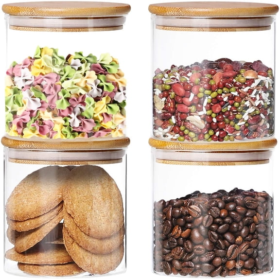 4-pack of glass jars with airtight bamboo lids. These clear glass kitchen storage jars are suitable for storing dried goods, spices, and other food items. Each jar has a capacity of 18.6 ounces.