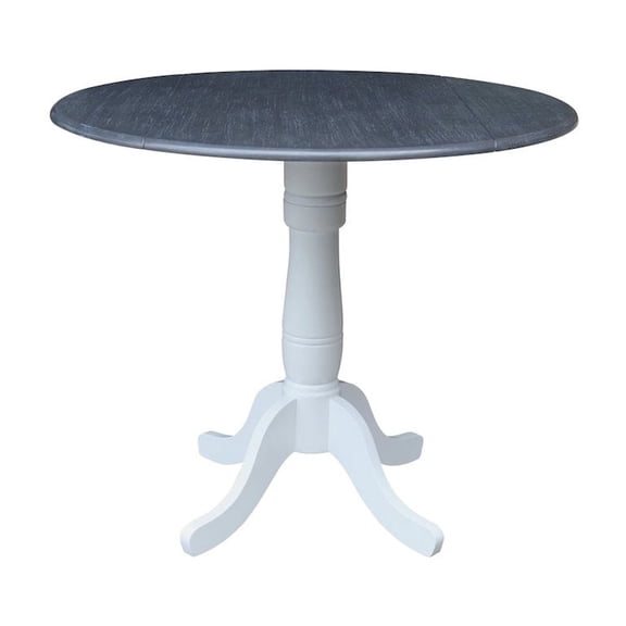 International Concepts 42 In Round dual drop Leaf Pedestal Table 35.5 "H
