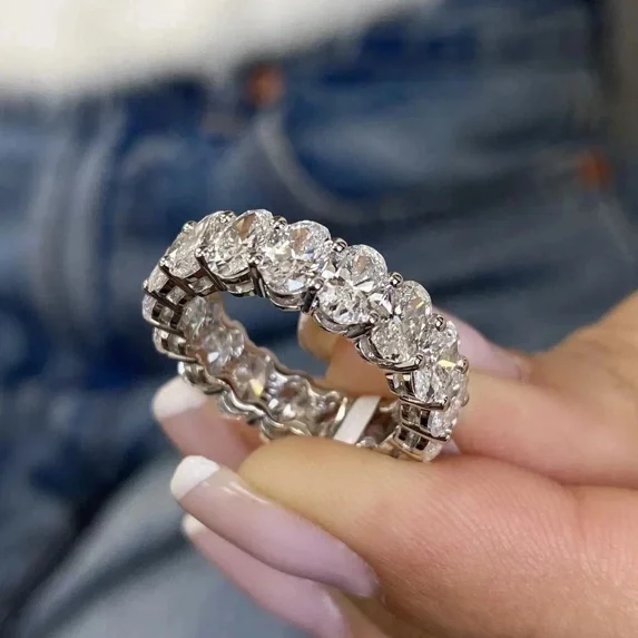 4TCW Oval Cut Lab Created Diamond Eternity Wedding Band Ring 14K White Gold Plated
