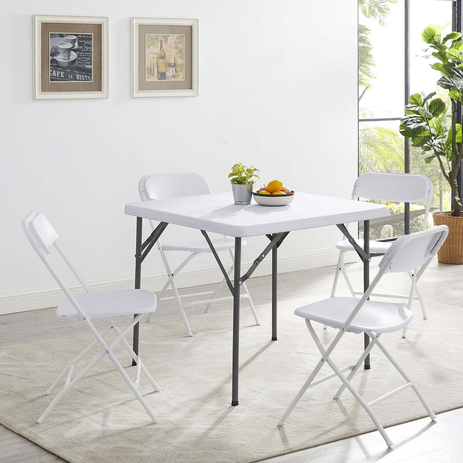 White fold away sale table and chairs