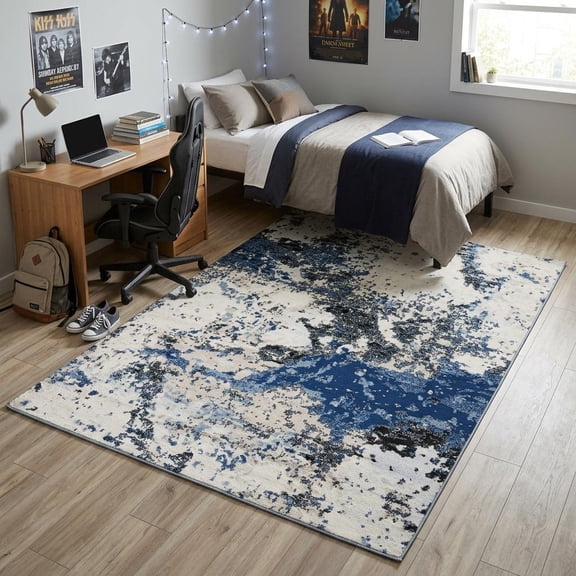 5' X 7' Blue Black Beige And Ivory Abstract Area Rug