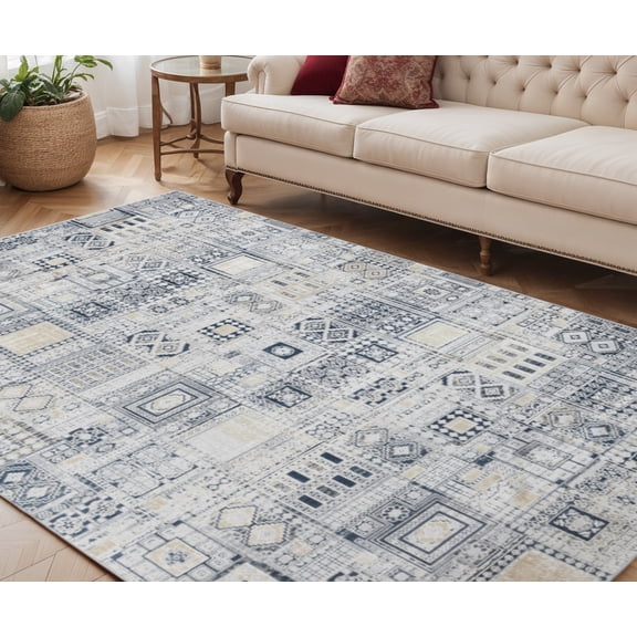 5' X 8' Ivory Black And Gold Ikat Area Rug