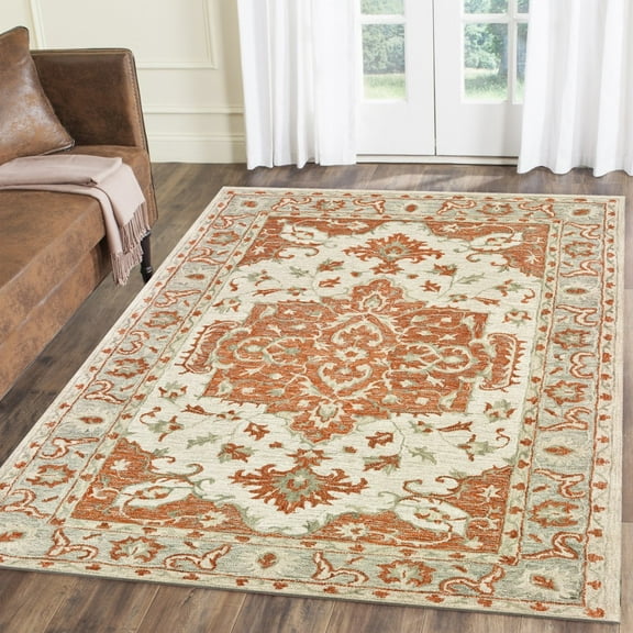 5â€™ x 8â€™ Orange and Ivory Medallion Area Rug