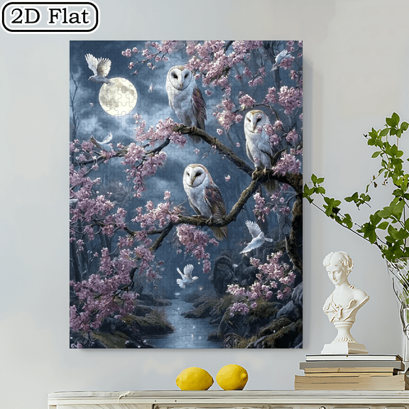 A 500pcs Puzzle Featuring Three Owls Sitting on a Blooming Branch. This Puzzle Is a Portable Cube Art Decoration, Making It an Excellent Option for Those Who Love Frameless Art.