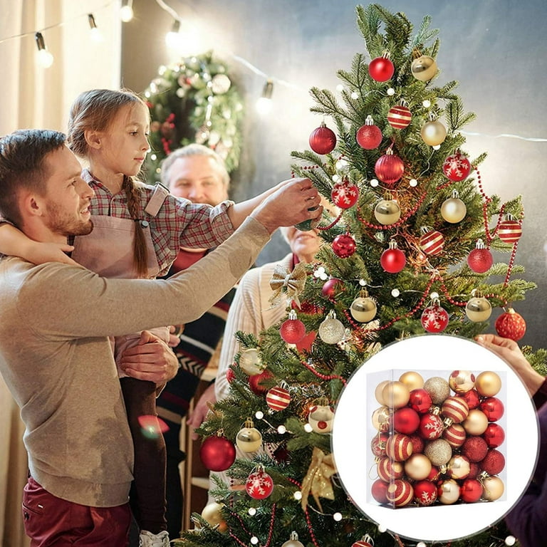 Decorating christmas on sale tree with balls