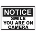 thumbnail image 1 of 5in x 3.5in Notice Smile You Are On Camera Sticker Vinyl Business Sign, 1 of 1