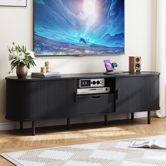 69 Inch TV Stand features a built-in power outlet is Compatible with up to 80 inches TVs, Includes ample storage, drawers, adjustable shelves, and a sliding door design, black
