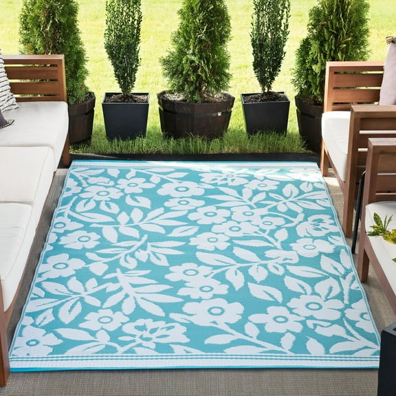 6x9 Reversible Aqua and White Polypropylene Outdoor Floral Area Rug