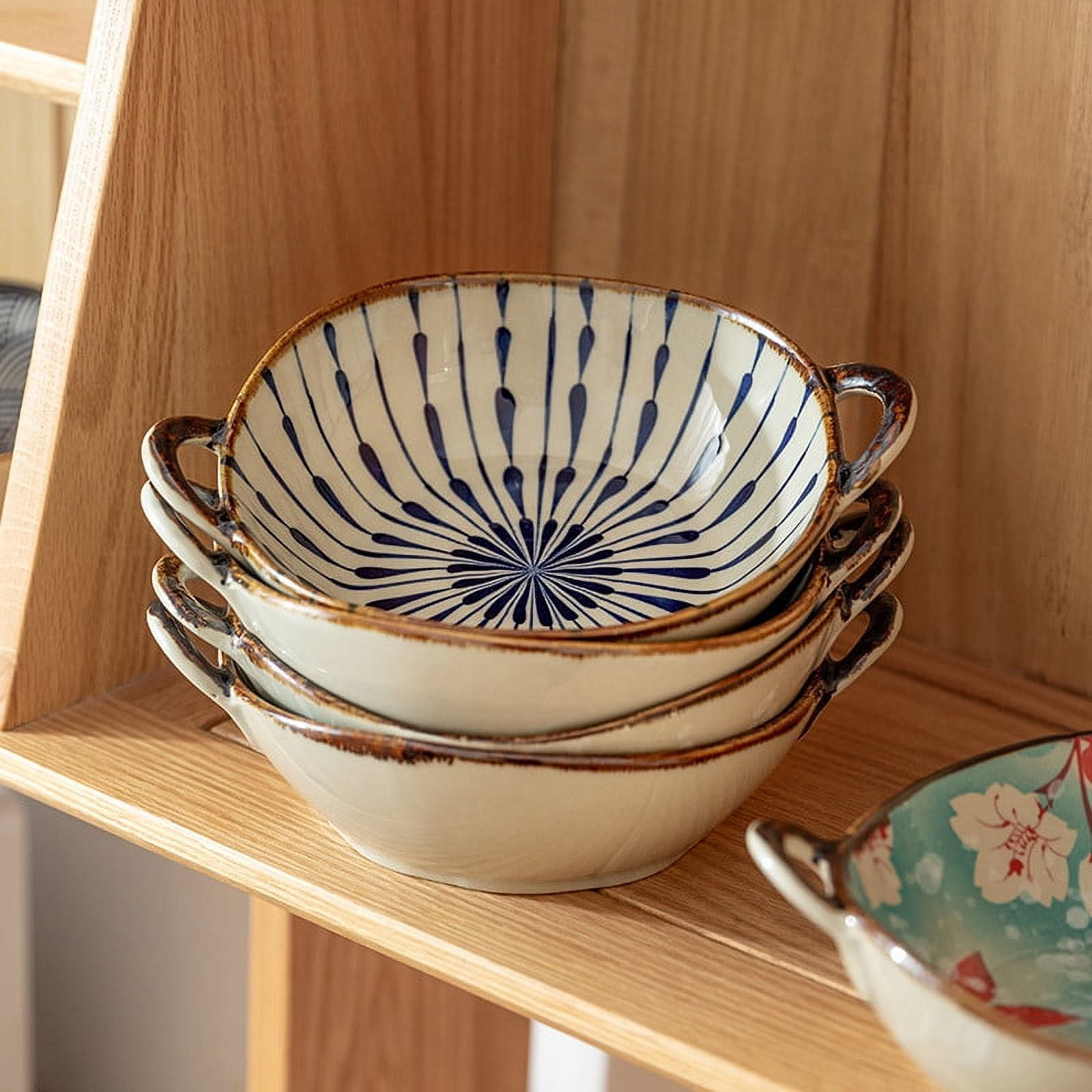 Serving bowls with clearance handles