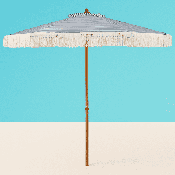 cotton patio umbrella DIY 6 Foot Palm Springs Wooden Tilt patio umbrella featuring a striped canopy and playful cotton fringe tassels for major vacation vibes Kbrellaoutlets Patio Fringe Umbrella with