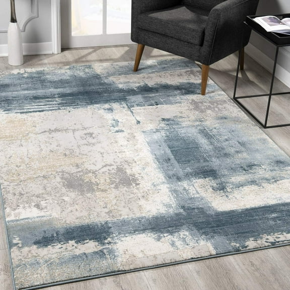 7’ x 10’ Cream and Blue Abstract Patches Area Rug
