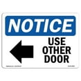 thumbnail image 1 of 7 x 10 in. OSHA Notice Sign - Use Other Door Left Arrow, 1 of 1