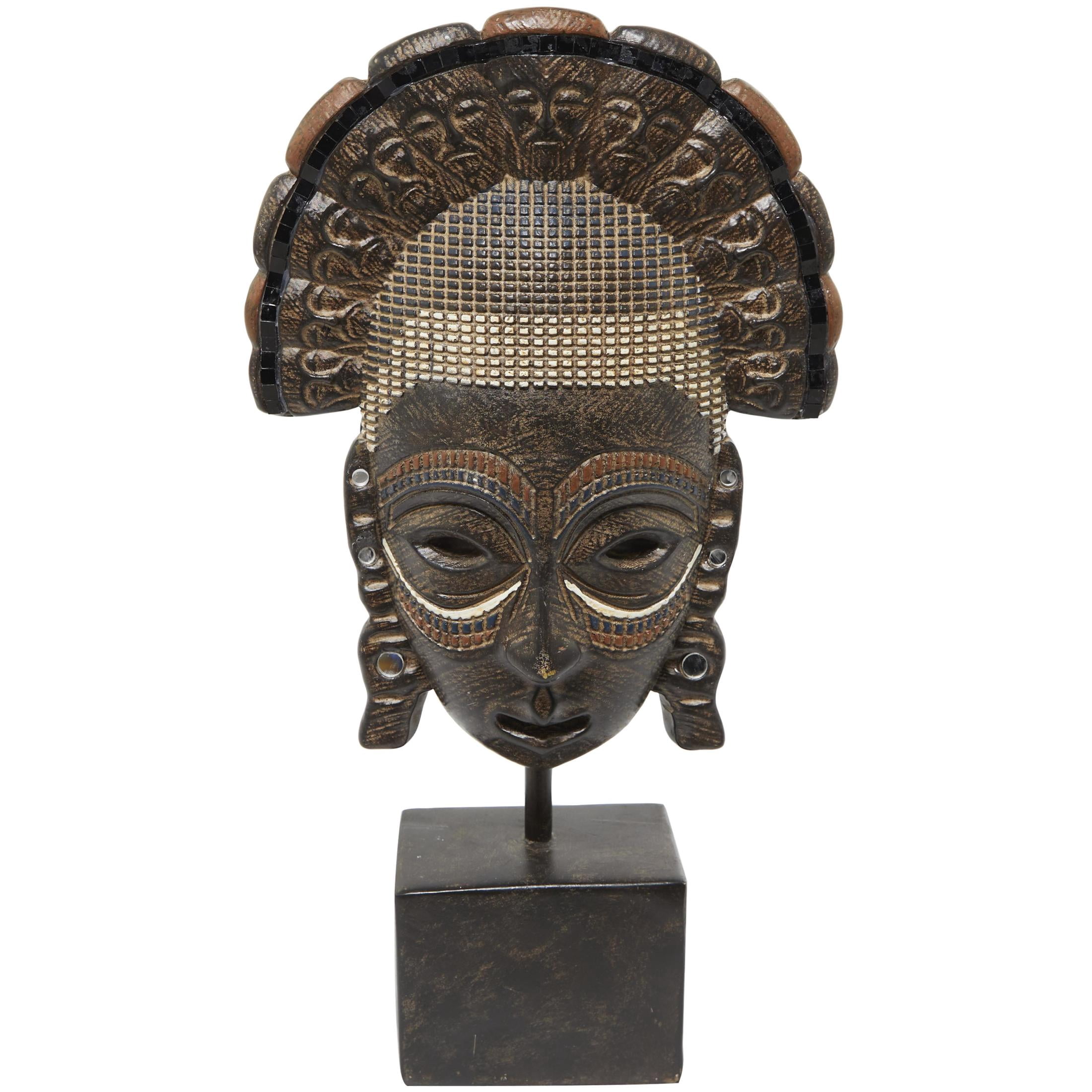 7" x 14" Brown Polystone African Tribal Mask Sculpture with Rust and Navy Carvings and Block Base, by DecMode