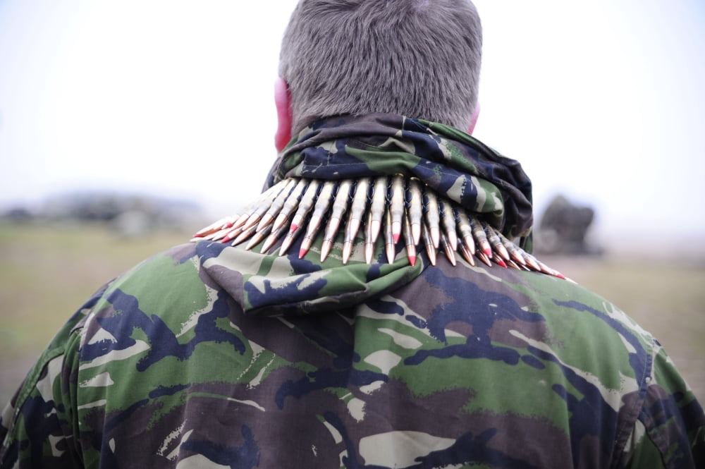 762mm rounds around the shoulders of a British soldier Canvas Art - Andrew ChittockStocktrek Images (17 x 12)