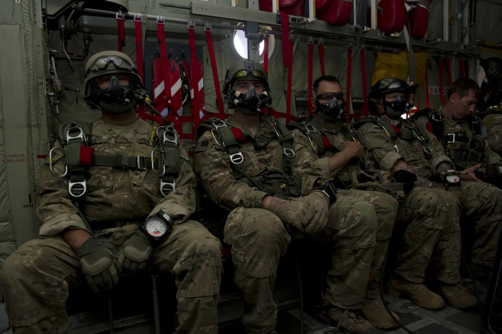 7th Special Forces Group Green Berets wait onboard a C-130 to conduct HALO jumps Canvas Art - Stocktrek Images (34 x 23)