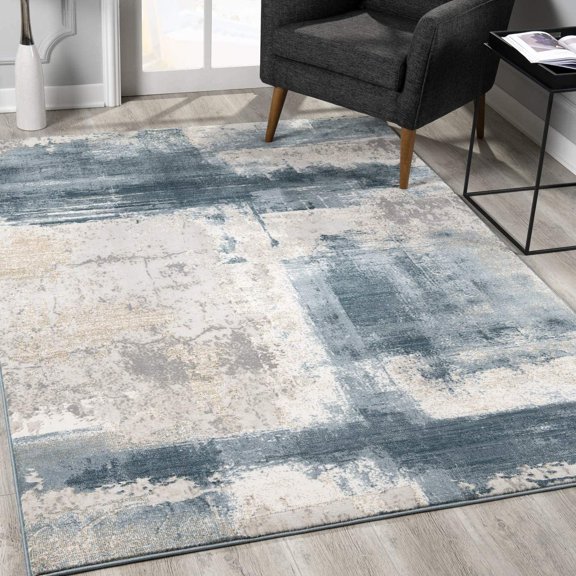 8â€™ x 11â€™ Cream and Blue Abstract Patches Area Rug