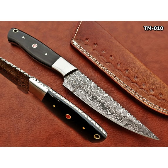 9.5" straight back blade skinning knife, 5" full tang Rain drop pattern Damascus steel blade, Bull horn scale with steel bolster, includes Cow hide Leather sheath (Bull horn)