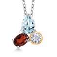 thumbnail image 1 of 925 Silver and 10K Yellow Gold Aquamarine and Red Garnet and White Moissanite 3 Stone Pendant Necklace for Women | 2.27 Cttw | Pear Shape 8X6MM | Oval 7X5MM | Round 5MM | with 18 inch Chain, 1 of 3