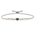 thumbnail image 1 of 925 Silver and 10K Yellow Gold Blue Mystic Topaz and White Moissanite and Lab Grown Diamond Bracelet for Women | 2.01 Cttw | Gemstone November Birthstone | Oval 7X5MM | Fully Adjustable 9", 1 of 5