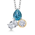 thumbnail image 1 of 925 Silver and 10K Yellow Gold London Blue Topaz and White Topaz and Moissanite 3 Stone Pendant Necklace for Women | 2.92 Cttw | Pear Shape 8X6MM | Oval 7X5MM | Round 5MM | with 18 inch Chain, 1 of 3