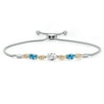 thumbnail image 1 of 925 Silver and 10K Yellow Gold White Created Sapphire and Swiss Blue Topaz and Lab Grown Diamond Bracelet for Women | 2.16 Cttw | Gemstone September Birthstone | Oval 7X5MM | Fully Adjustable 9", 1 of 5