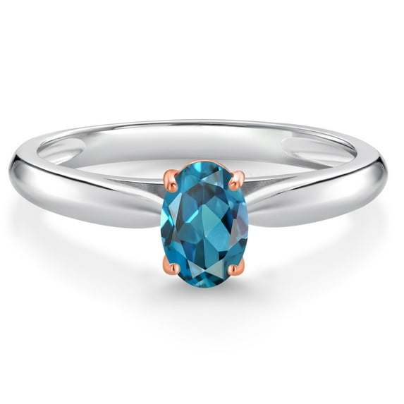 925 Sterling Silver and 10K Rose Gold Prongs London Blue Topaz Solitaire Engagement Ring for Women (0.60 Cttw, Oval 6X4MM, Gemstone November Birthstone, Available in Size 5, 6, 7, 8, 9)