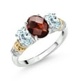 thumbnail image 1 of Gem Stone King 925 Sterling Silver and 10K Yellow Gold Oval Red Garnet Sky Blue Aquamarine and White Diamond 3 Stone Ring for Women (2.56 Cttw, Gemstone January Birthstone, Size 7), 1 of 3