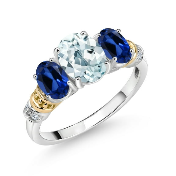 Gem Stone King 925 Sterling Silver and 10K Yellow Gold Oval Sky Blue Aquamarine Blue Created Sapphire and White Diamond 3 Stone Ring for Women (2.43 Cttw, Gemstone March Birthstone, Size 5)