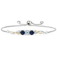 thumbnail image 1 of 925 Sterling Silver and 10K Yellow Gold Sky Blue Topaz Blue Sapphire and White Lab Grown Diamond Tennis Bracelet for Women (1.92 Cttw, Gemstone November Birthstone, Fully Adjustable up to 9 inch), 1 of 4